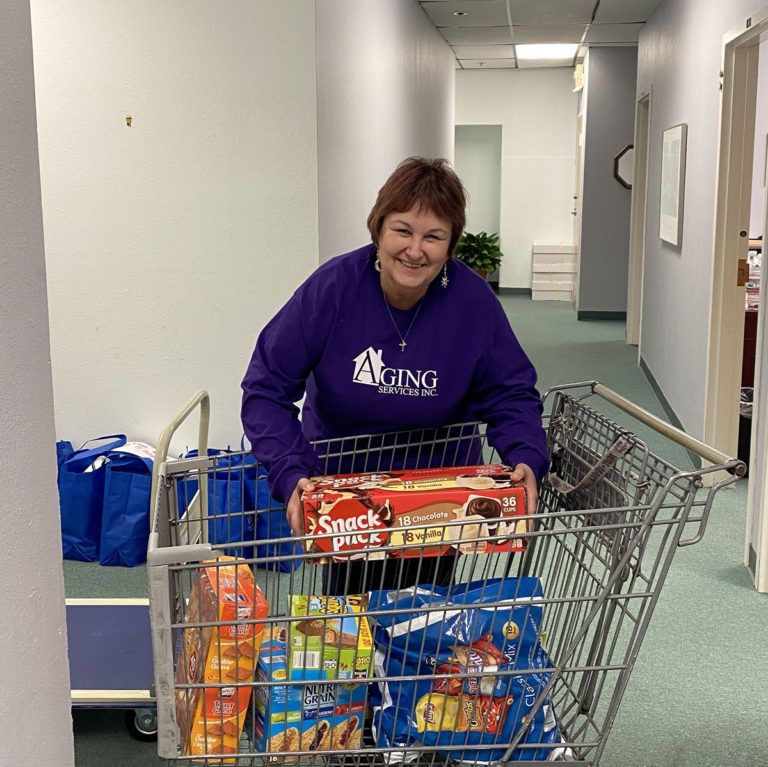 Tammy unloading donations